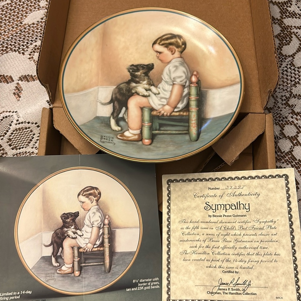 A child’s best friend. Collectors Hamilton collection. Little boy and puppy